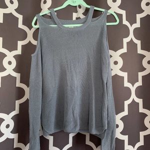Two holed blue sweater